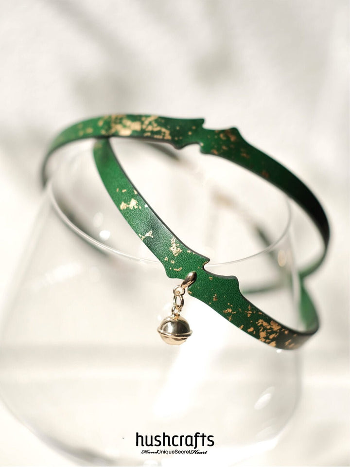 Adjustable green leather day collar choker by HushCrafts – handcrafted from goatskin with gold embellishment and bell charm for a soft feminine edge.