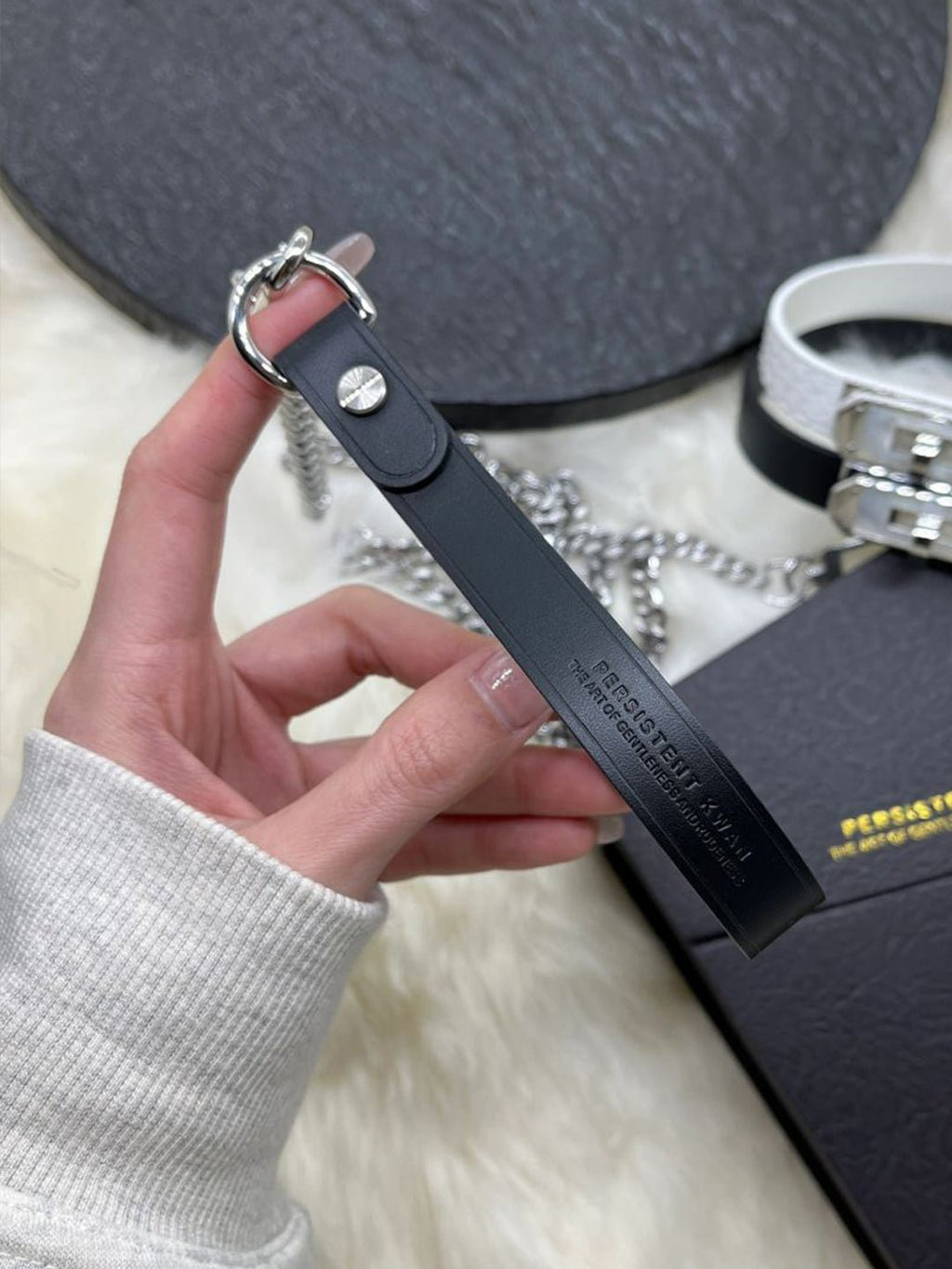 Black leather BDSM leash featuring durable leather restraints by HushCrafts. A stylish and functional accessory for roleplay enthusiasts and alternative fashion lovers.