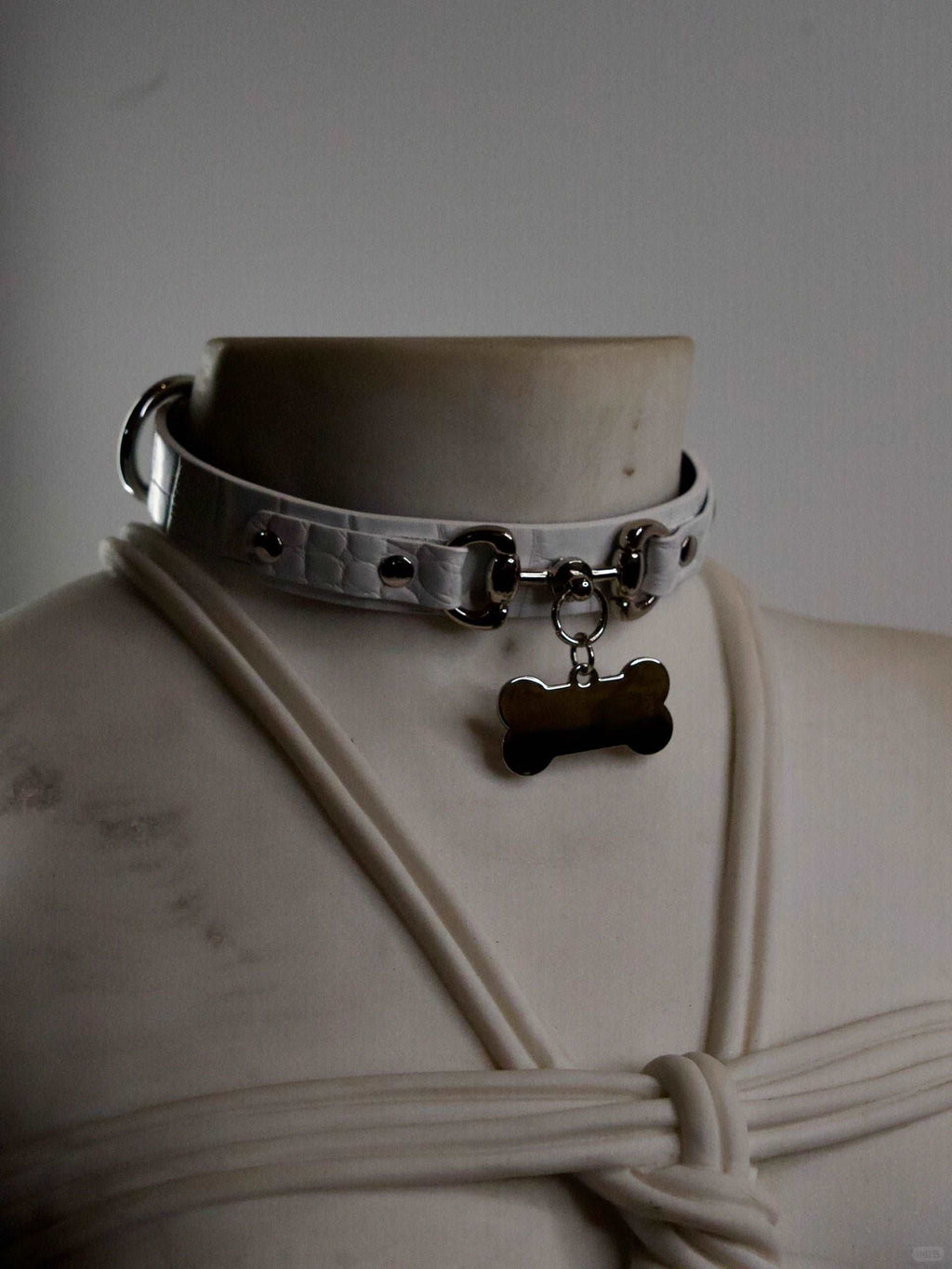 Elegant day collar for women, designed with a high-quality genuine leather finish and a secure lock chain necklace. This collar and necklace combination showcases a stylish S&M collar, making it the perfect accessory for daily wear while adding a touch of bold sophistication. Crafted by HushCrafts.
