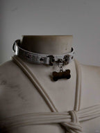 Elegant day collar for women, designed with a high-quality genuine leather finish and a secure lock chain necklace. This collar and necklace combination showcases a stylish S&M collar, making it the perfect accessory for daily wear while adding a touch of bold sophistication. Crafted by HushCrafts.