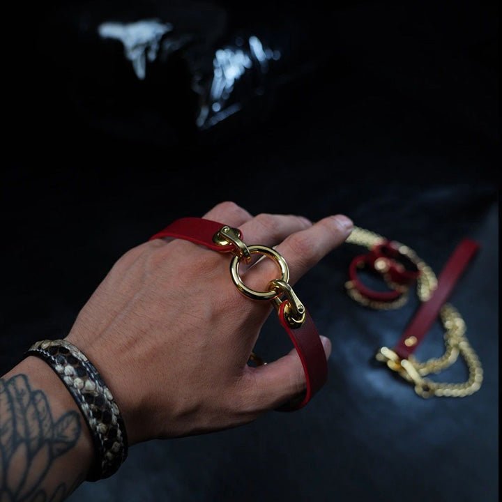 HushCrafts red lock choker with a ceremonial collar design, featuring a secure lock-in necklace and a bold O-ring collar for a unique, commanding look.