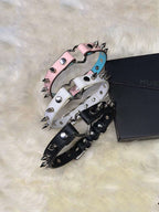 HushCrafts spiked leather collars in black, white, and pink. Bold and stylish design with metal spikes for an edgy look.
