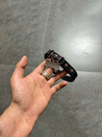 This is a black leather bondage collar featuring a key and lock jewelry design, commonly used in BDSM collaring, perfect for those seeking a unique and stylish collar for submission.