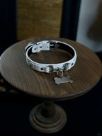 Luxurious lockable collar crafted from premium genuine leather, designed for style and durability. This bondage collar and leash combination features an elegant interlocking necklace detail, complemented by a secure chain and lock necklace design. A sophisticated and functional accessory from HushCrafts.